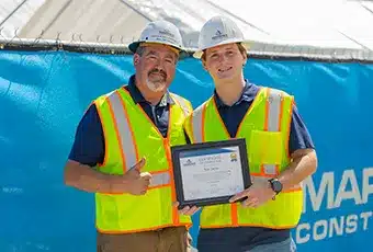 photo of a Marmer Construction employee with an intern